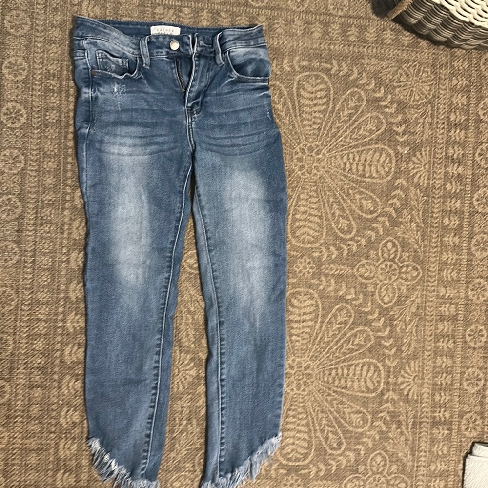 Women’s freyed bottom jeans